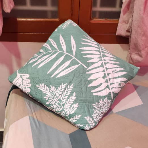 Quilted cushion covers top